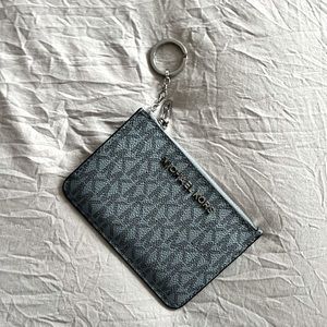 Micheal Kors keychain wallet. Never used